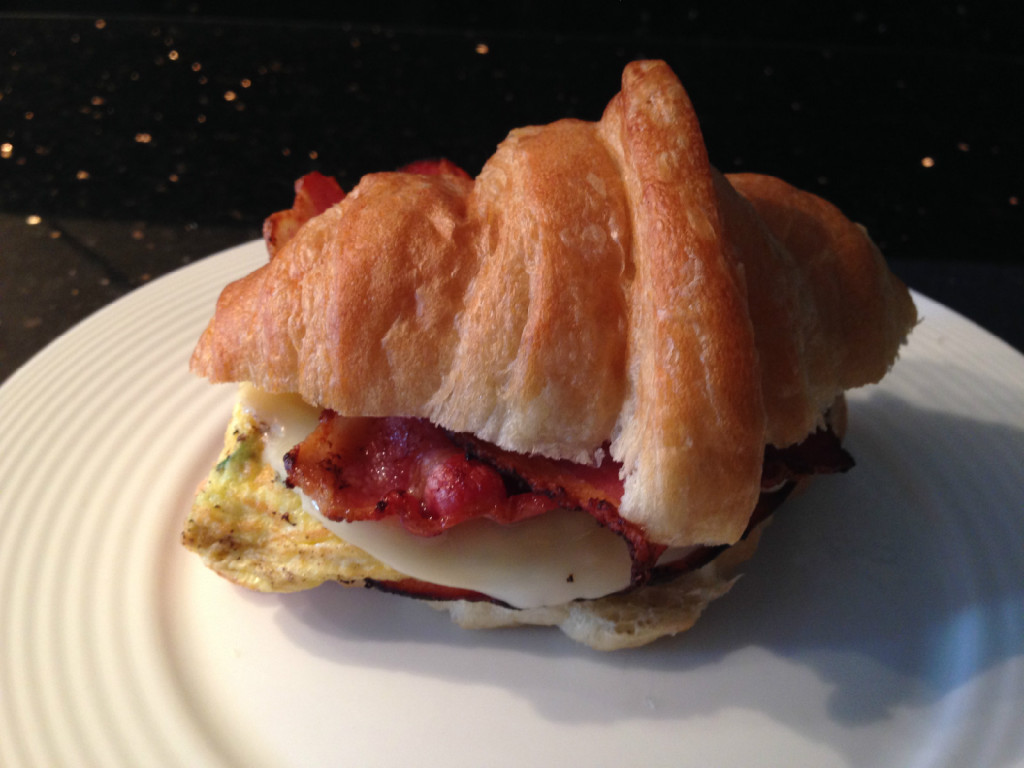 BaconandEggsonCroisantwithBlackForestHamGreenOnionsandProvoloneCheeese